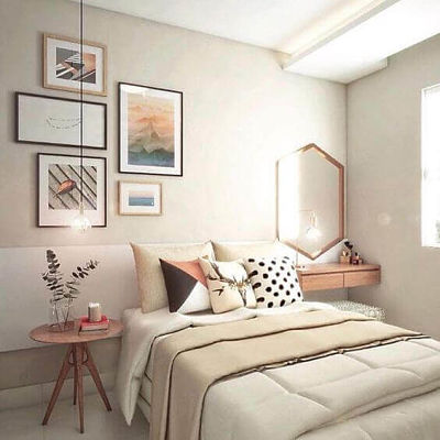 Decoração de quarto de casal simples com luminária pendente e quadros 