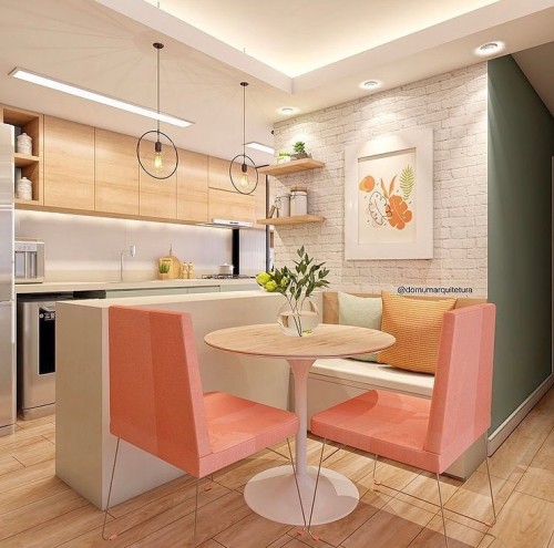 cozinha americana integrada com a sala e banco e cadeiras 