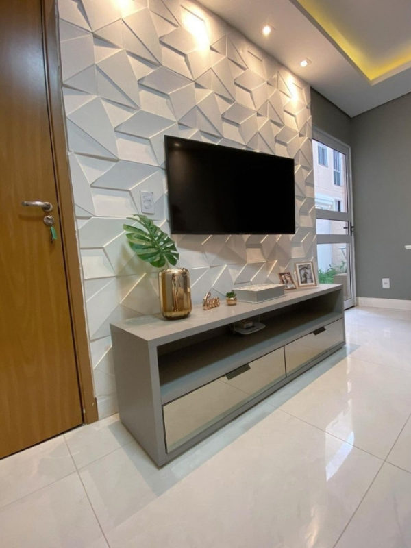 Parede com gesso 3d na sala de tv
