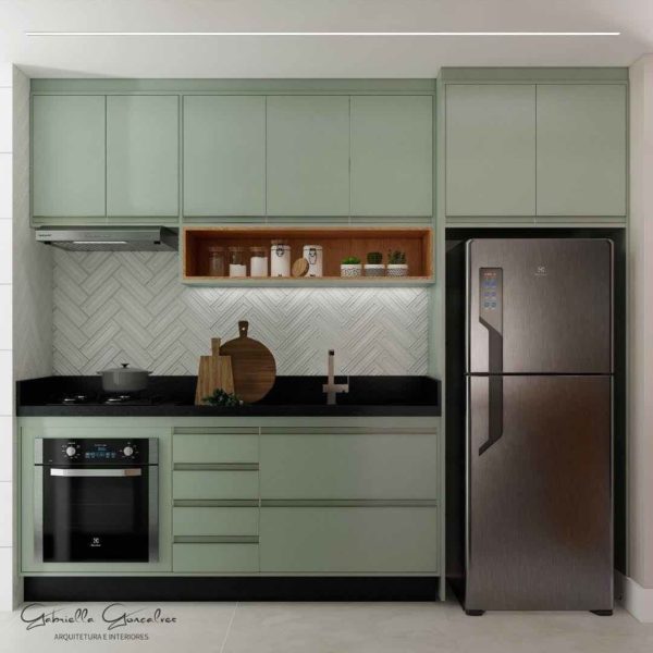 Cozinha planejada simples e pequena com armário verde